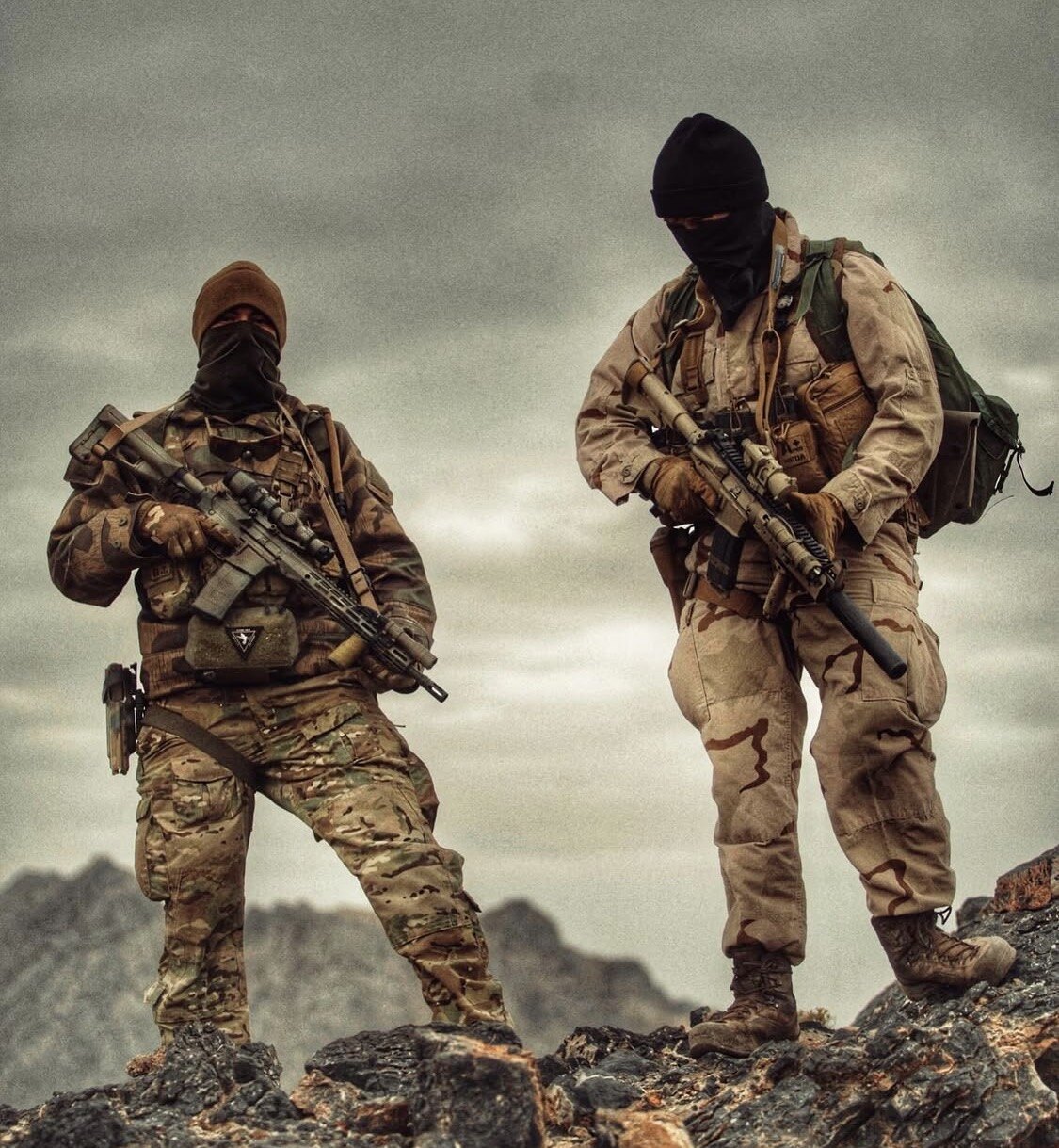 Two operators in kit on a ridge